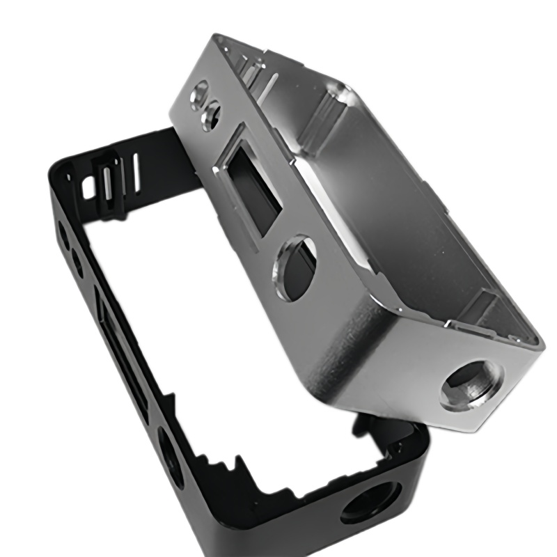 CNC machined metal enclosure housing with precision cutouts and complex structural design