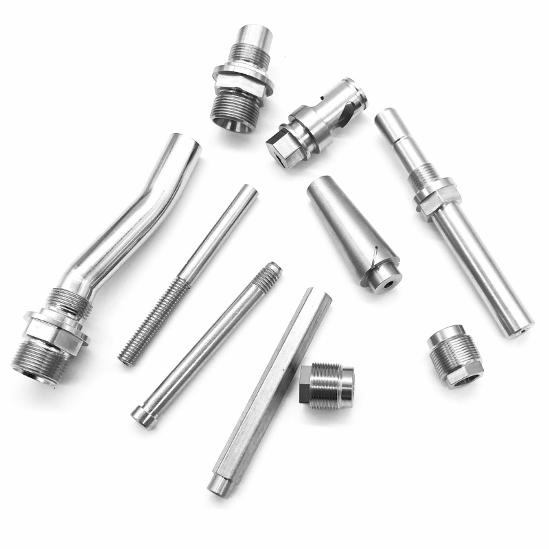 Custom CNC machined stainless steel parts including shafts, fittings and threaded components